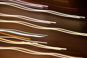 Road light traces. Trail lines background. Traffic bright lamps tracks. photo