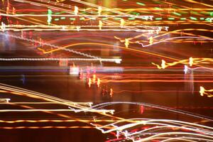 Trail lines background. Traffic bright lamps tracks. Road light traces. photo
