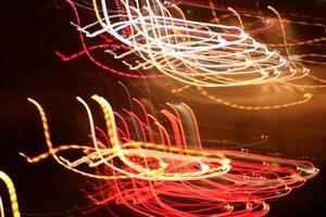 Road light traces. Trail lines background. Traffic bright lamps tracks. photo