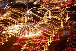 Trail lines background. Traffic bright lamps tracks. Road light traces. photo