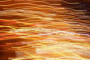 Traffic bright lamps tracks. Road light traces. Trail lines background. photo