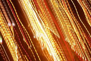 Trail lines background. Traffic bright lamps tracks. Road light traces. photo