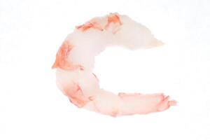 Isolated boiled peeled shrimp meat. Prawn seafood snack. photo