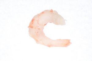 Isolated boiled peeled shrimp meat. Prawn seafood snack. photo