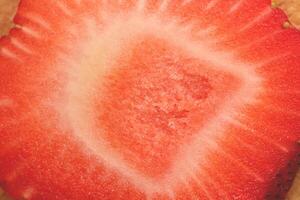 Sweet strawberry texture. Filling background delicious backdrop. photo