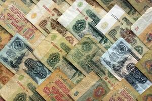 Old Russian earning pattern. Rubles money banknotes texture. Soviet cash filling background. Wealth financial backdrop. photo