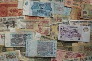 Cash filling background. Wealth financial backdrop. Earning pattern. Money banknotes texture. photo