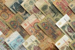Russian cash filling background. Old rubles wealth financial backdrop. Soviet earning pattern. Money banknotes texture. photo