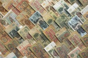 Old Russian wealth financial backdrop. Rubles earning pattern. Soviet money banknotes texture. Cash filling background. photo