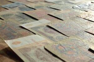 Old Russian cash filling background. Rubles wealth financial backdrop. Earning pattern. Soviet money banknotes texture. photo