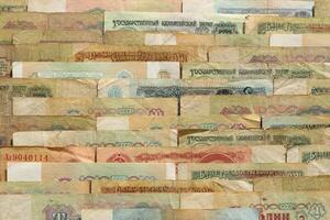 Old Russian wealth financial backdrop. Rubles earning pattern. Soviet money banknotes texture. Cash filling background. photo
