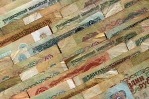 Old Russian earning pattern. Rubles money banknotes texture. Soviet cash filling background. Wealth financial backdrop. photo