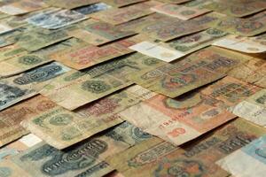 Old Russian earning pattern. Rubles money banknotes texture. Soviet cash filling background. Wealth financial backdrop. photo