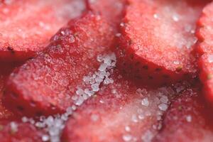 Red healthy tasty strawberry with sugar texture. Fresh vitamin berry backdrop. Sliced strawberry in sugar filling background. photo