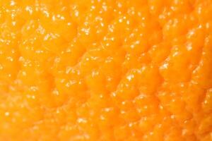 Fresh citrus filling texture. Orange crust background. photo