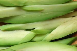 Fresh health avocado slices. Filling background. Macro closeup. photo