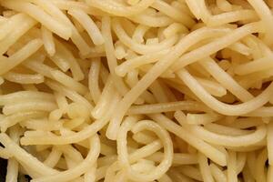 Cooked pasta. Filling spaghetti texture. Macaroni background. photo