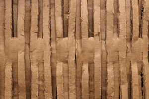 Ribbed carton texture. Fluted paper backdrop. Corrugated cardboard filling background. photo