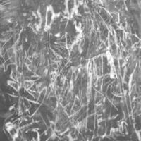 Crumpled cellophane texture. Plastic light reflection filling background. photo