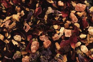 Scattered tea pattern. Many dry flowers background. Lot of dry red petals texture. photo