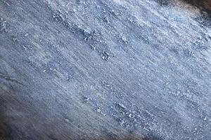 Hoarfrost wood log texture. A log covered with frost background. photo