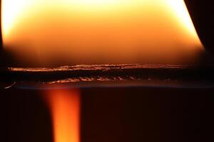 Glowing dangerous burl light backdrop. Danger blazing flame. Burning flames background. Blaze fire texture. photo
