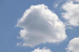 Clouds rotors and orographic altocumulus. Cloudscape blue sky sunlight texture. photo