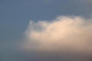Blue sky altocumulus lenticularis clouds fantastic background. photo