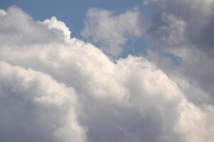 Blue sky cumulus congestus clouds fantastic background. photo