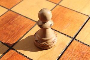 Chess figures background. Wood game chessboard. photo