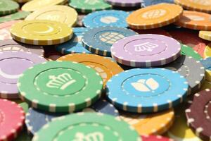 Many colored chips backdrop. Lot multicolor assorted gambling playing chips surface. Colorful casino chips background. photo