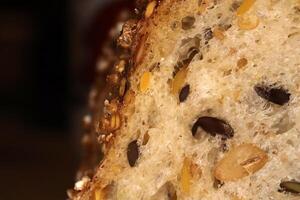 Fief grains bread crumb surface. Flax seeds bread crumb texture. Diet food background. photo