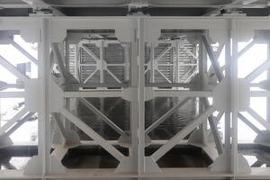 Massive metal structure under the bridge photo