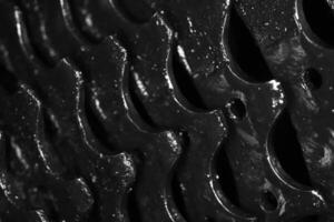 Dark Dirty Bicycle Gears Texture. Macro Monochrome Closeup Background. photo
