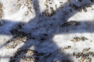 Sea wave foam texture with shadow. Marine aqua motion surface background. Outdoor water froth swirls backdrop. photo