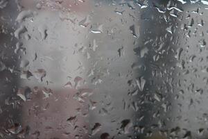Drops of water on the window after the rain. Macro closeup photo