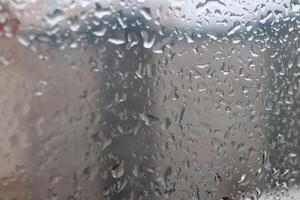 Drops of water on the window after the rain. Macro closeup photo