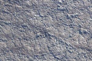 Fractured textured nature stone pattern surface. photo