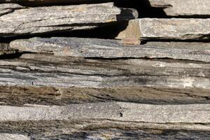 Detail stone layers wall structure surface. photo