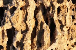 detail stone wall structure surface. photo
