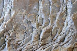 Light gray layers detailed rock background texture. photo