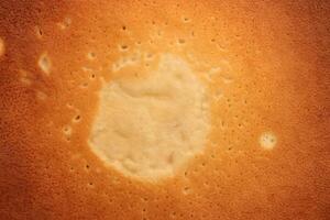 Backed tasty detail pancake background texture. Macro closeup. photo