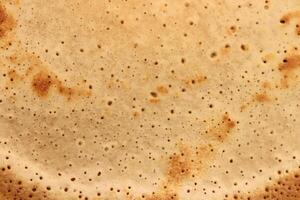 Light toasted sweet and warm pancake surface texture breakfast. Macro closeup. photo