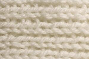 White Wool Knitting Texture. Horizontal Along Weaving Crochet Detailed Rows. Sweater Textile Background. Macro Closeup. photo