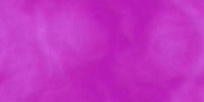 Lilac violet plush textile background. Seamless velour texture. Velours fabric backdrop. photo