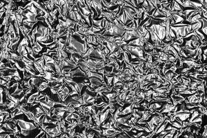 Monochrome Metallic Crumpled Foil Texture. Black White Background. photo