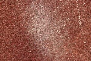 Red Sandpaper Texture. Rough Grit Abrasive Background. Used Grain Emery Backdrop. photo