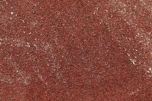 New Red Sandpaper Texture. Rough Grit Abrasive Background. Used Grain Emery Backdrop. photo