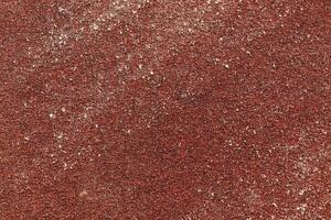 Red Sandpaper Texture. Rough Grit Abrasive Background. Used Grain Emery Backdrop. photo