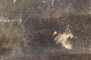 Black Sandpaper Texture with Wood Attrition. Rough Grit Abrasive Background. Used Grain Emery Backdrop. photo